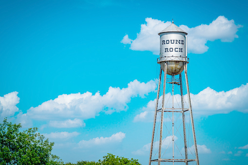 On a nice sunny afternoon in small town north of Austin , Texas - Round Rock , TX , USA - Water Tower